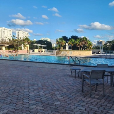 Discover your dream lifestyle in this stunning, fully upgraded on Turnberry Isle Resort and Club in Florida - for sale on GolfHomes.com, golf home, golf lot