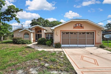 Located in Spring Hill, Hernando County, 6121 Piedmont Dr sits on Oak Hills Country Club in Florida - for sale on GolfHomes.com, golf home, golf lot