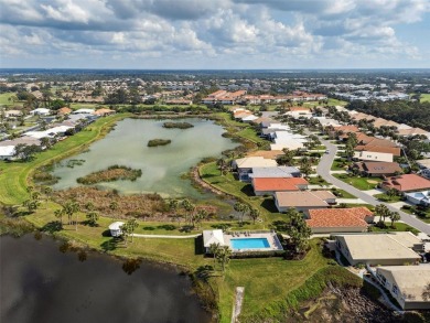 This well-built and meticulously cared-for Waterford Carina on Capri Isle Golf Club in Florida - for sale on GolfHomes.com, golf home, golf lot