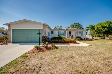 This beautiful two-bedroom, two-bath plus den home is located in on Pine Lakes Country Club in Florida - for sale on GolfHomes.com, golf home, golf lot