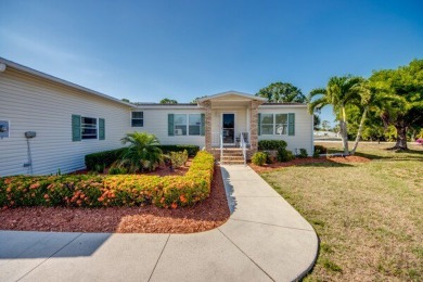 This beautiful two-bedroom, two-bath plus den home is located in on Pine Lakes Country Club in Florida - for sale on GolfHomes.com, golf home, golf lot