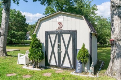Wake up every day to the beauty of lakefront living in a on Lake Tansi Village Country Club in Tennessee - for sale on GolfHomes.com, golf home, golf lot