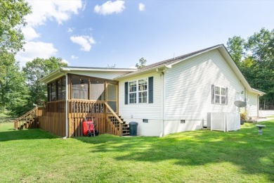 Wake up every day to the beauty of lakefront living in a on Lake Tansi Village Country Club in Tennessee - for sale on GolfHomes.com, golf home, golf lot