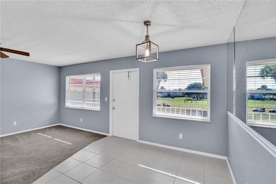 Welcome to easy Florida living at 105 Spring Lake Ct. #203 in on The American Golf Club in Florida - for sale on GolfHomes.com, golf home, golf lot