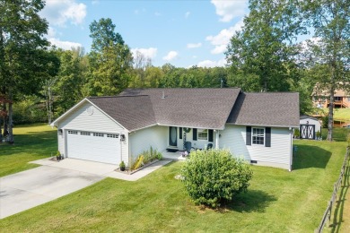 Wake up every day to the beauty of lakefront living in a on Lake Tansi Village Country Club in Tennessee - for sale on GolfHomes.com, golf home, golf lot