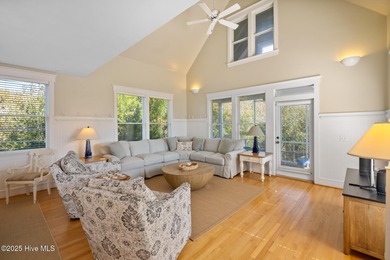 This exquisite high-dunes cottage exudes coastal charm with on Bald Head Island Golf Club in North Carolina - for sale on GolfHomes.com, golf home, golf lot