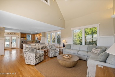 This exquisite high-dunes cottage exudes coastal charm with on Bald Head Island Golf Club in North Carolina - for sale on GolfHomes.com, golf home, golf lot