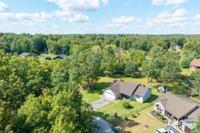 Wake up every day to the beauty of lakefront living in a on Lake Tansi Village Country Club in Tennessee - for sale on GolfHomes.com, golf home, golf lot