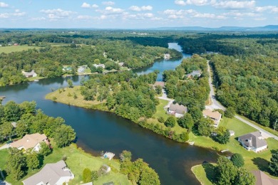 Wake up every day to the beauty of lakefront living in a on Lake Tansi Village Country Club in Tennessee - for sale on GolfHomes.com, golf home, golf lot