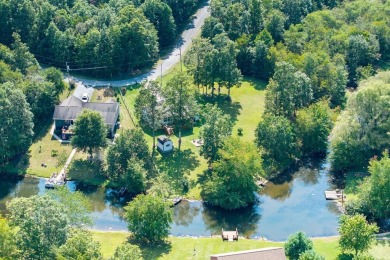 Wake up every day to the beauty of lakefront living in a on Lake Tansi Village Country Club in Tennessee - for sale on GolfHomes.com, golf home, golf lot