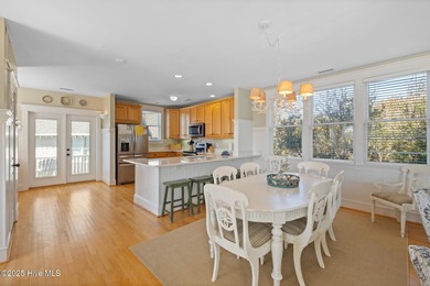 This exquisite high-dunes cottage exudes coastal charm with on Bald Head Island Golf Club in North Carolina - for sale on GolfHomes.com, golf home, golf lot