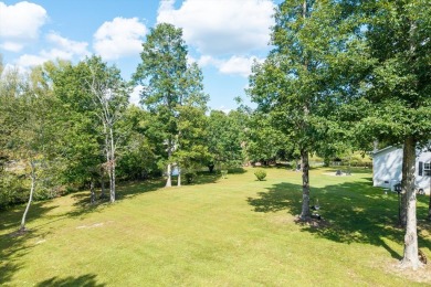 Wake up every day to the beauty of lakefront living in a on Lake Tansi Village Country Club in Tennessee - for sale on GolfHomes.com, golf home, golf lot