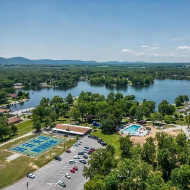 Wake up every day to the beauty of lakefront living in a on Lake Tansi Village Country Club in Tennessee - for sale on GolfHomes.com, golf home, golf lot