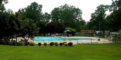 Wake up every day to the beauty of lakefront living in a on Lake Tansi Village Country Club in Tennessee - for sale on GolfHomes.com, golf home, golf lot