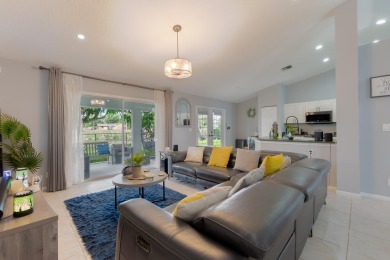 Come and experience this beautiful and peaceful waterview home on The Links At Madison Green in Florida - for sale on GolfHomes.com, golf home, golf lot