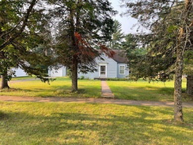 Within Hayward's city limits is this great 3-bedroom, 1 bathroom on Hayward Golf and Tennis Club in Wisconsin - for sale on GolfHomes.com, golf home, golf lot