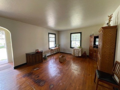 Within Hayward's city limits is this great 3-bedroom, 1 bathroom on Hayward Golf and Tennis Club in Wisconsin - for sale on GolfHomes.com, golf home, golf lot