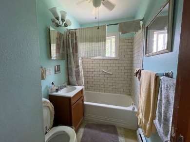 Within Hayward's city limits is this great 3-bedroom, 1 bathroom on Hayward Golf and Tennis Club in Wisconsin - for sale on GolfHomes.com, golf home, golf lot