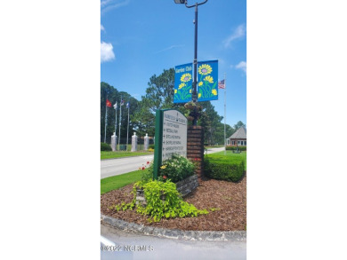 Vacant lot for you to build your dream home in fabulous on Harbour Point Golf Club in North Carolina - for sale on GolfHomes.com, golf home, golf lot
