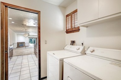 This lovely townhome in sought after Chimney Ridge sits directly on Arroyo Del Oso Golf Course in New Mexico - for sale on GolfHomes.com, golf home, golf lot