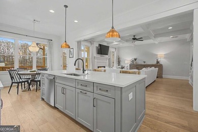 Welcome to a home that truly raises the bar in Traditions of on Traditions of Braselton Golf Club in Georgia - for sale on GolfHomes.com, golf home, golf lot