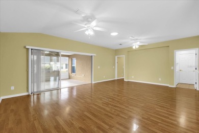Welcome to this beautifully maintained Challedon model home in on Eagle Ridge At Spruce Creek Country Club in Florida - for sale on GolfHomes.com, golf home, golf lot