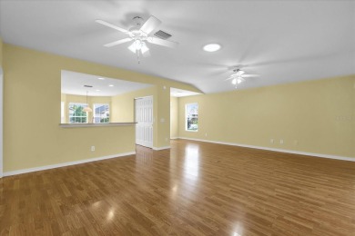 Welcome to this beautifully maintained Challedon model home in on Eagle Ridge At Spruce Creek Country Club in Florida - for sale on GolfHomes.com, golf home, golf lot