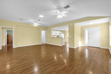 Welcome to this beautifully maintained Challedon model home in on Eagle Ridge At Spruce Creek Country Club in Florida - for sale on GolfHomes.com, golf home, golf lot