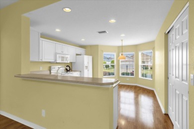Welcome to this beautifully maintained Challedon model home in on Eagle Ridge At Spruce Creek Country Club in Florida - for sale on GolfHomes.com, golf home, golf lot