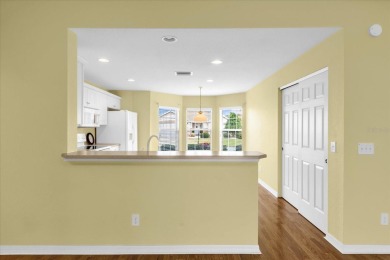 Welcome to this beautifully maintained Challedon model home in on Eagle Ridge At Spruce Creek Country Club in Florida - for sale on GolfHomes.com, golf home, golf lot