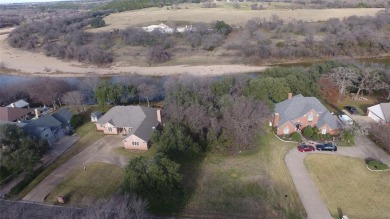 Discover one of the last remaining RIVERFRONT lots in the highly on Pecan Plantation Country Club in Texas - for sale on GolfHomes.com, golf home, golf lot