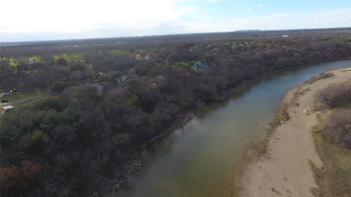 Discover one of the last remaining RIVERFRONT lots in the highly on Pecan Plantation Country Club in Texas - for sale on GolfHomes.com, golf home, golf lot