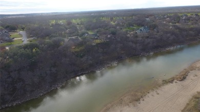 Discover one of the last remaining RIVERFRONT lots in the highly on Pecan Plantation Country Club in Texas - for sale on GolfHomes.com, golf home, golf lot