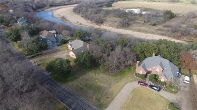 Discover one of the last remaining RIVERFRONT lots in the highly on Pecan Plantation Country Club in Texas - for sale on GolfHomes.com, golf home, golf lot