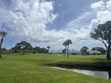 Sunrise view over the water and golf course from this 2/2/1 on Gator Trace Golf and Country Club in Florida - for sale on GolfHomes.com, golf home, golf lot