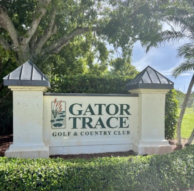 Sunrise view over the water and golf course from this 2/2/1 on Gator Trace Golf and Country Club in Florida - for sale on GolfHomes.com, golf home, golf lot