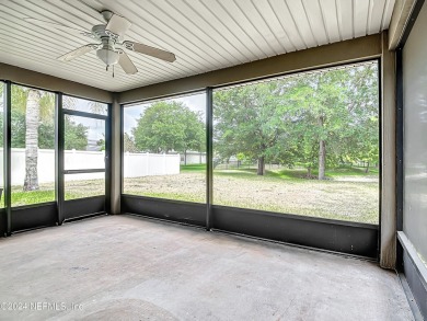 Prior model home featuring a finished air-conditioned garage and on St. Johns Golf and Country Club in Florida - for sale on GolfHomes.com, golf home, golf lot