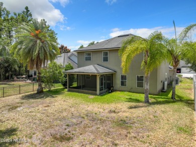 Prior model home featuring a finished air-conditioned garage and on St. Johns Golf and Country Club in Florida - for sale on GolfHomes.com, golf home, golf lot