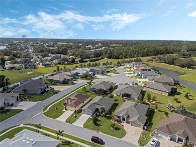 Welcome to your dream home in the highly sought-after 55+ on Arlington Ridge Golf Club in Florida - for sale on GolfHomes.com, golf home, golf lot