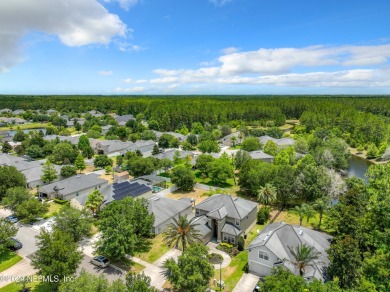 Prior model home featuring a finished air-conditioned garage and on St. Johns Golf and Country Club in Florida - for sale on GolfHomes.com, golf home, golf lot