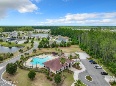 Prior model home featuring a finished air-conditioned garage and on St. Johns Golf and Country Club in Florida - for sale on GolfHomes.com, golf home, golf lot