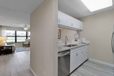 If expansive lake views, resort style living, & a luxurious on Vista Plantation Golf Club in Florida - for sale on GolfHomes.com, golf home, golf lot