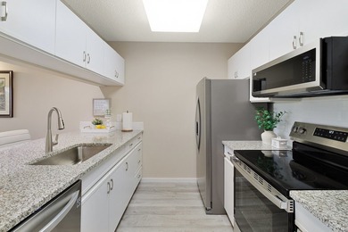 If expansive lake views, resort style living, & a luxurious on Vista Plantation Golf Club in Florida - for sale on GolfHomes.com, golf home, golf lot