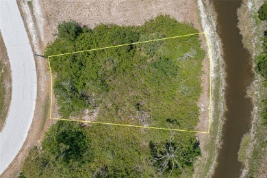 VACANT LOT IN ROTONDA LAKES W/CANAL VIEW - Claim your spot in on Rotonda Golf and Country Club - Long Marsh  in Florida - for sale on GolfHomes.com, golf home, golf lot