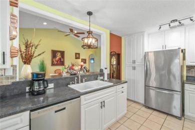 Welcome to this beautifully updated Turnberry Extended model on Royal Oaks Golf Club in Florida - for sale on GolfHomes.com, golf home, golf lot