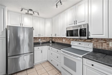 Welcome to this beautifully updated Turnberry Extended model on Royal Oaks Golf Club in Florida - for sale on GolfHomes.com, golf home, golf lot