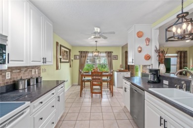 Welcome to this beautifully updated Turnberry Extended model on Royal Oaks Golf Club in Florida - for sale on GolfHomes.com, golf home, golf lot