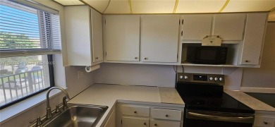 Bright and well-maintained 2BD/2BA unit in desirable Sunrise on Sunrise Lakes Phase IV Golf Course in Florida - for sale on GolfHomes.com, golf home, golf lot