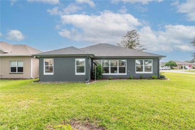 Welcome to this beautifully updated Turnberry Extended model on Royal Oaks Golf Club in Florida - for sale on GolfHomes.com, golf home, golf lot