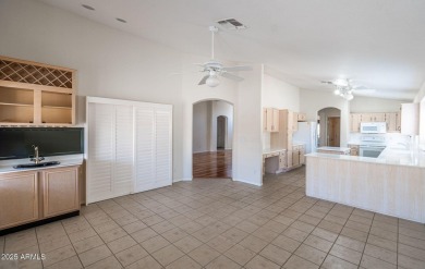 RESORT LIVING. Located in the desirable 55+ adult gated on Sun Village Golf Course in Arizona - for sale on GolfHomes.com, golf home, golf lot